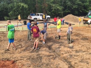 Alibamu Lodge is building a new volleyball court at their camp.